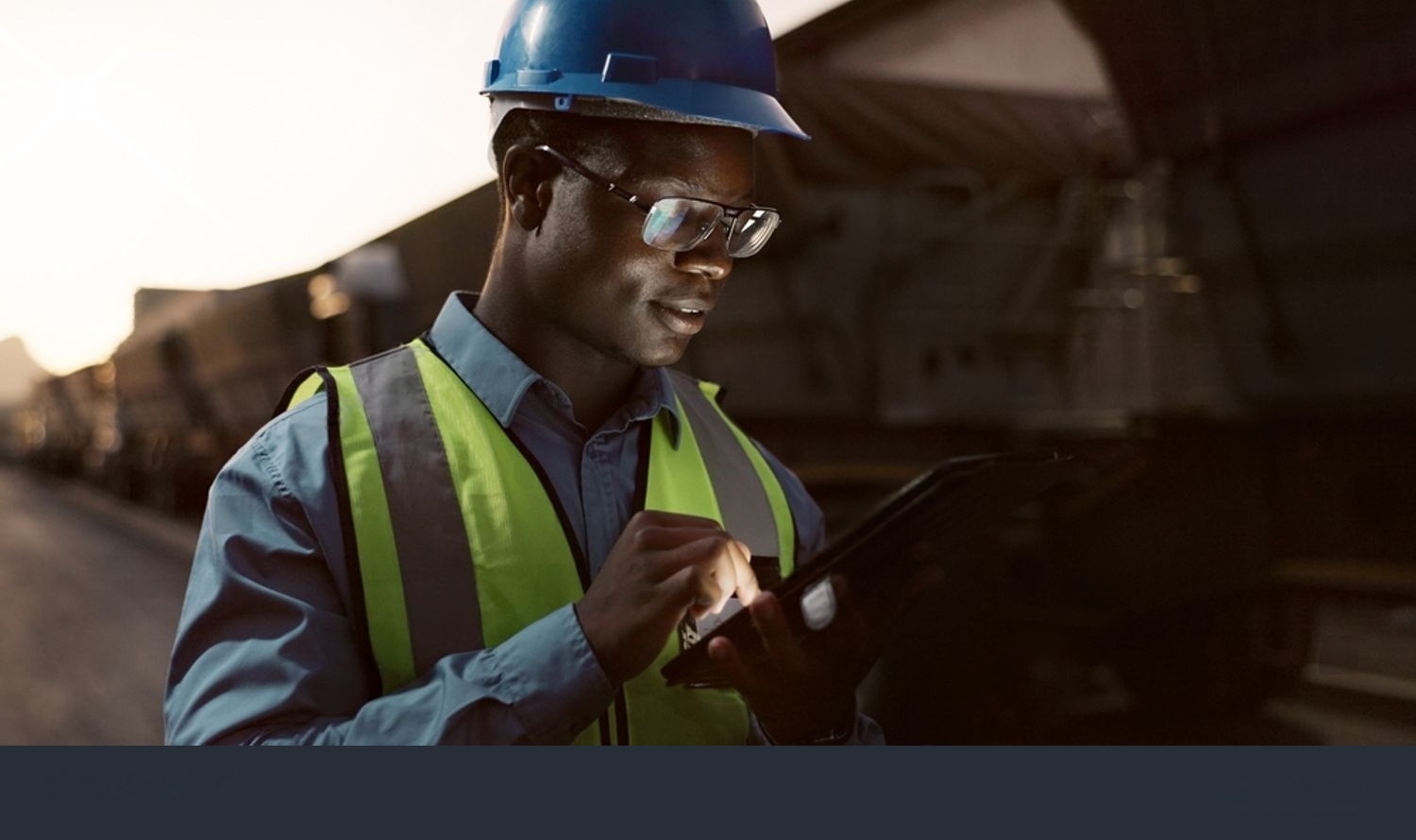 Professional engineer with tablet at construction site in Nigeria